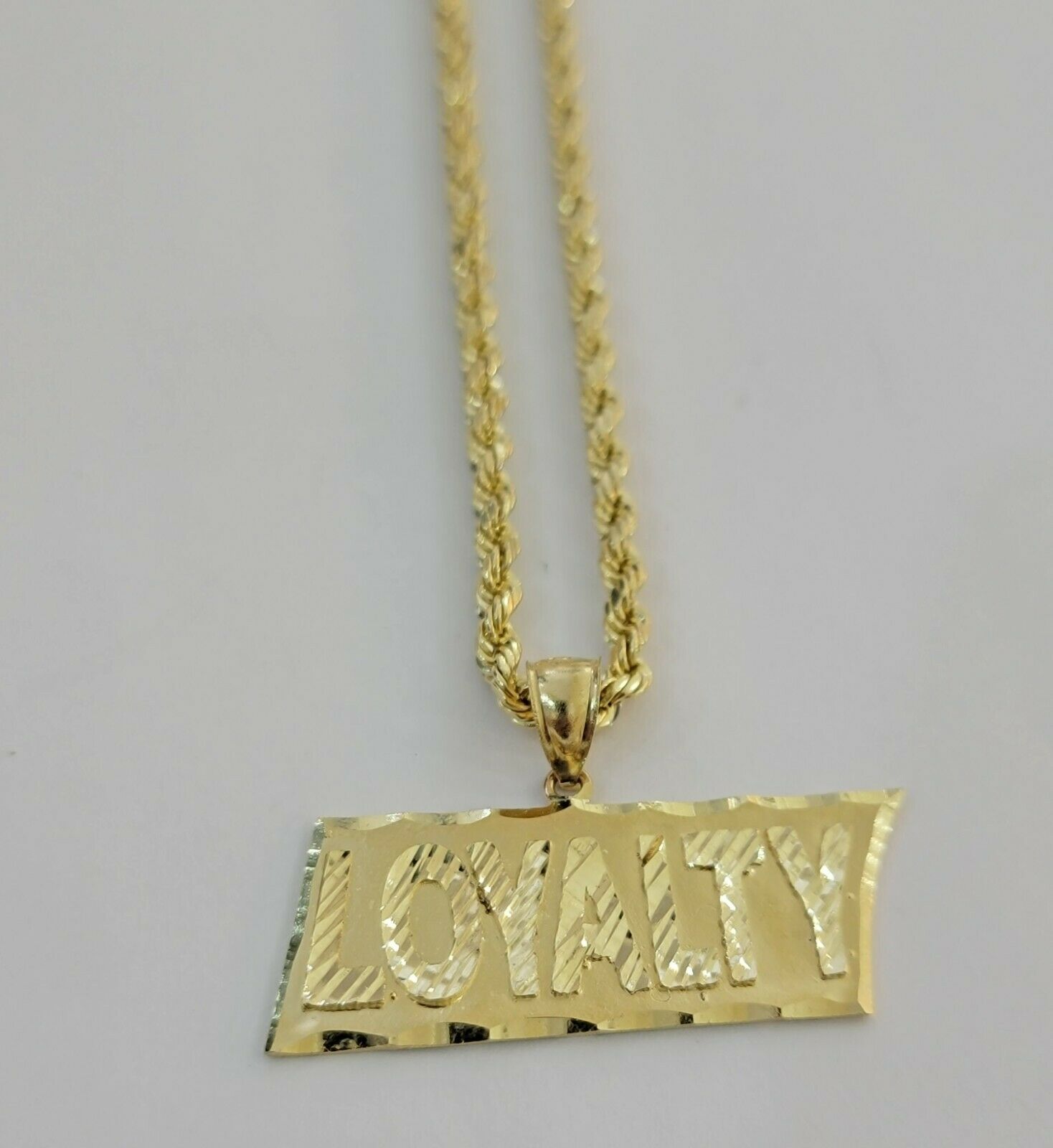 10k Yellow Gold Pendant & 10kt Rope Necklace 22